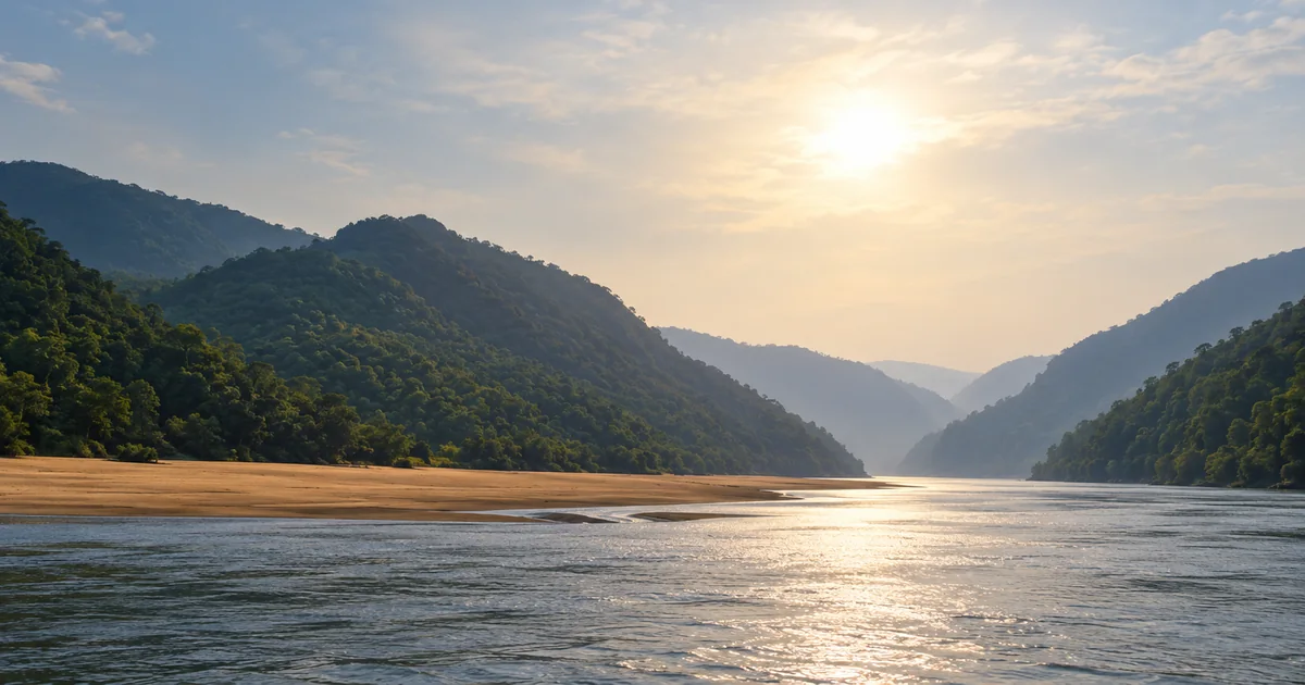 Illustrative Mahanadi river and sandbars between forested hills at Tikarpada