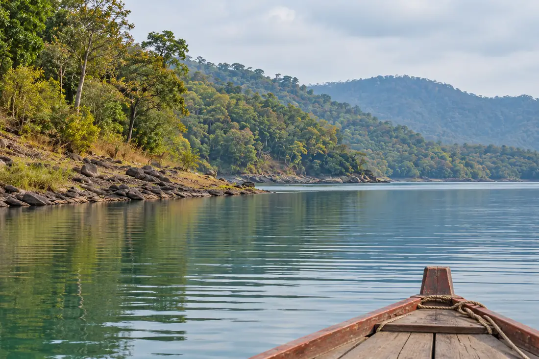 View from a boat on Hirakud Reservoir toward Debrigarh’s wooded shore