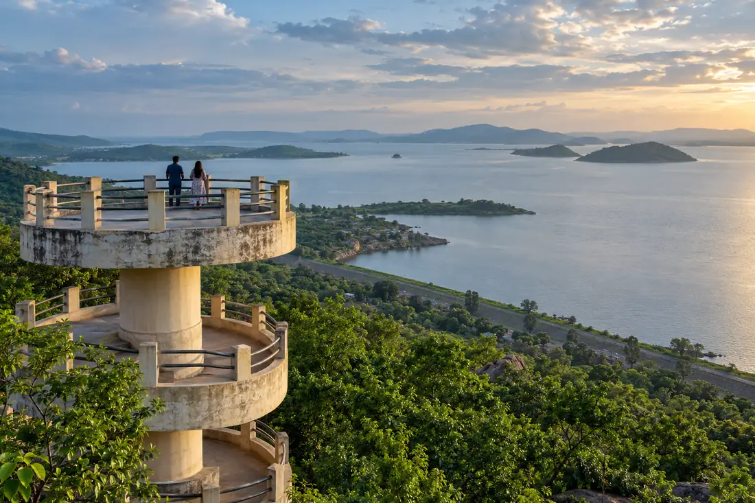 Visitors look across Hirakud reservoir from the Gandhi Minar viewpoint