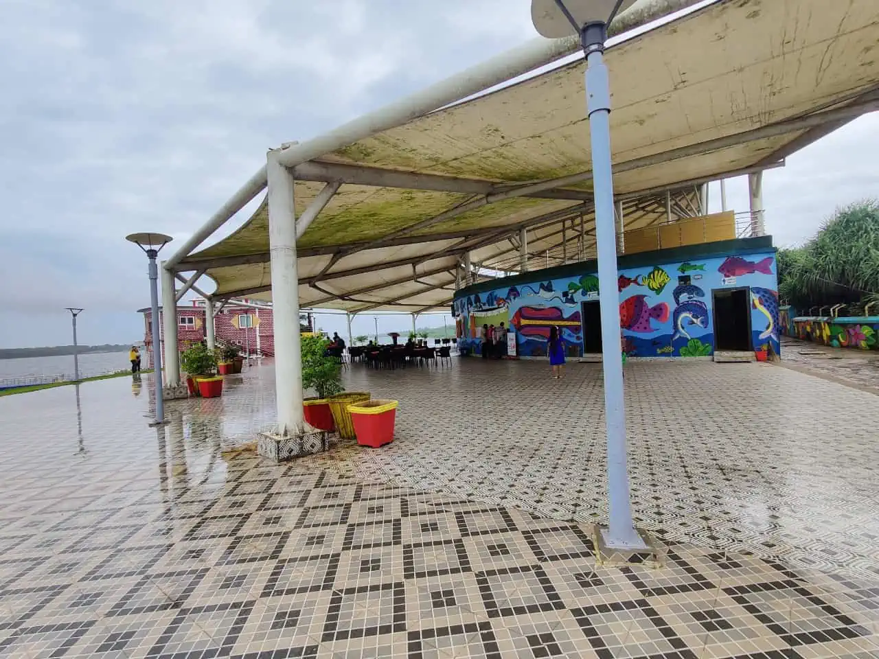 The modern food court area at Tampara Lake, offering a variety of local snacks and refreshments for visitors.